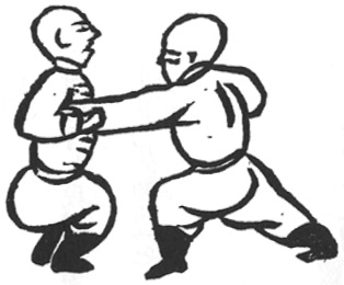 Le coude du poing plié